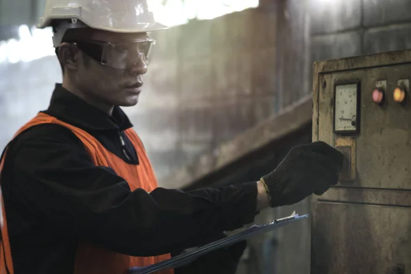 depositphotos_439472422-stock-photo-industrial-engineer-worker-wearing-helmet